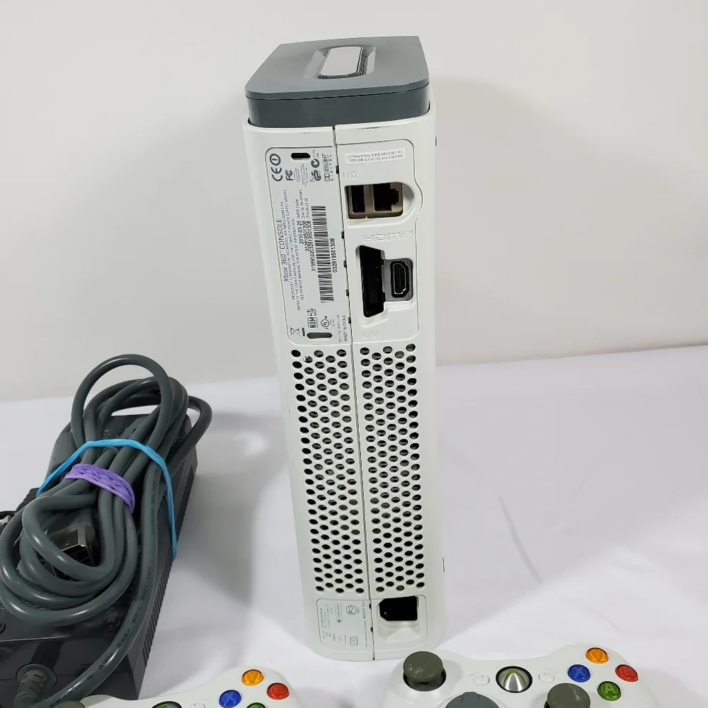 Xbox 360 with 4 games, 2 Controllers Tested Excellent.Condition is Excellent,